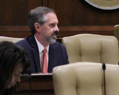 senator-clarke-tucker-senator-greg-leding-and-senator-jane-english-listening-to-a-report-during-the-alc-meeting-on-october-20-2023