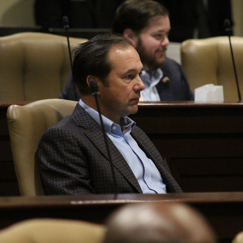 senator-jim-petty-listening-to-a-report-at-the-alc-meeting-october-20-2023