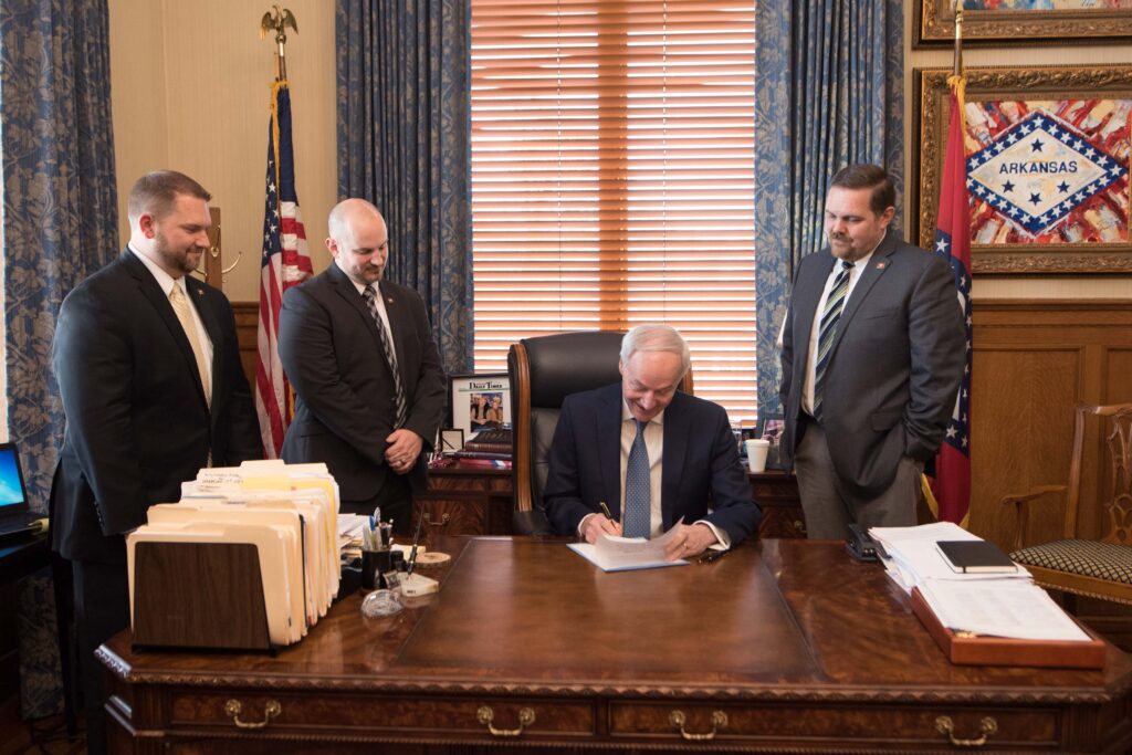 senator-trent-garner-and-senator-bob-ballinger-with-rep-dotson-when-gov-asa-signed-sb-17-into-law