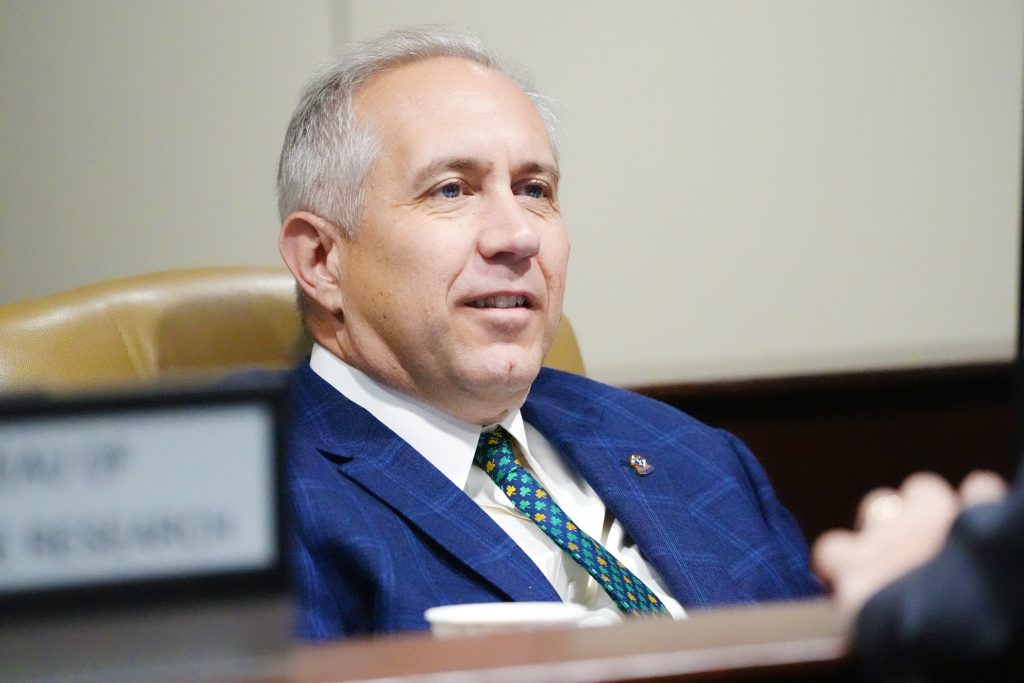 Senator Boyd listens during a committee meeting.