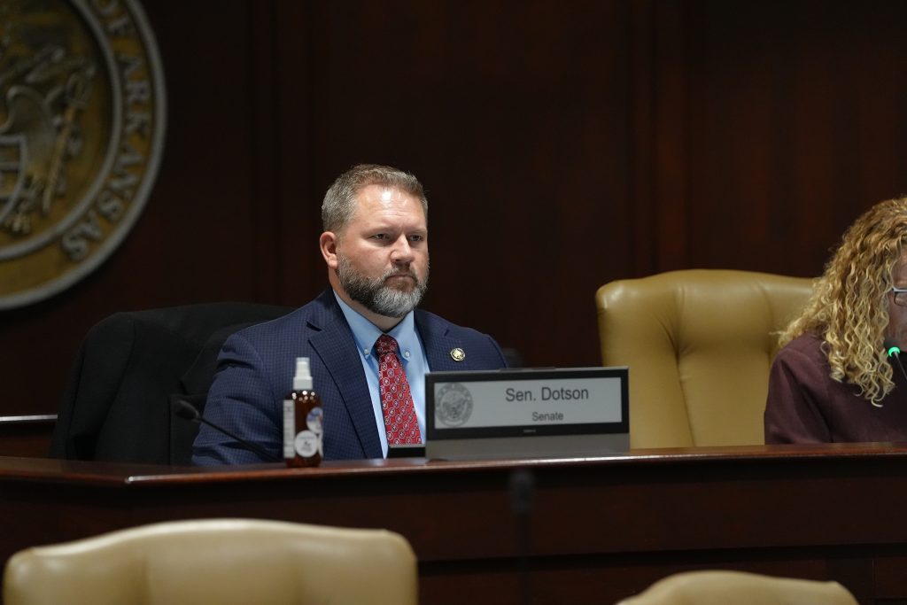 Senator Dotson listens to testimony during a committee meeting