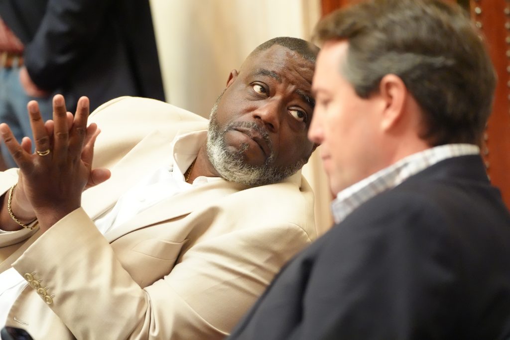 Senator Murdock looking back at a colleague during a session in the Senate chamber