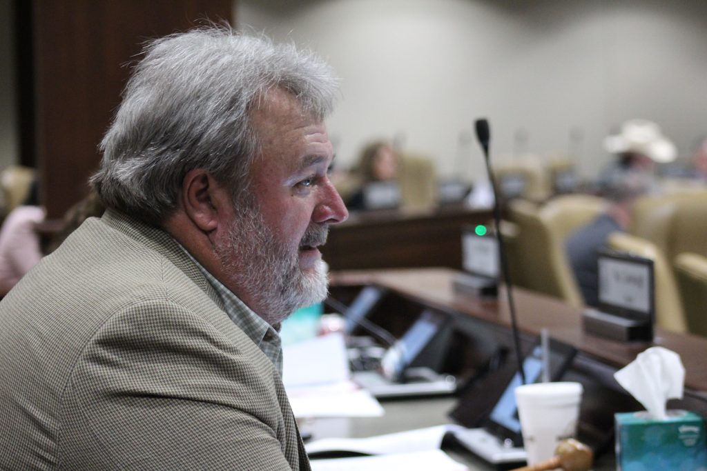 Senator Blake Johnson listens during a committee meeting