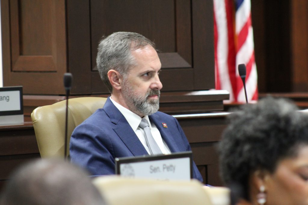 Senator Leding listens during a committee meeting