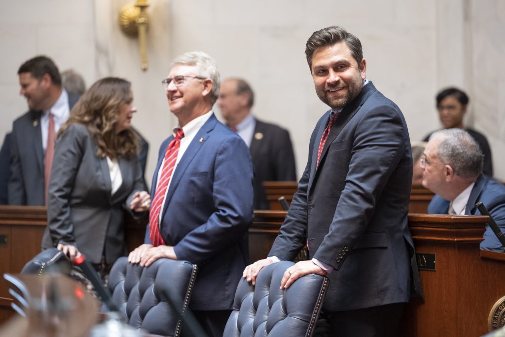 Senator Hill and Senator Dismang smile as the session is brought to a close