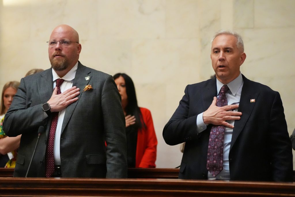 Senators Crowell and Boyd recite the Pledge of Allegiance in the Senate chamber