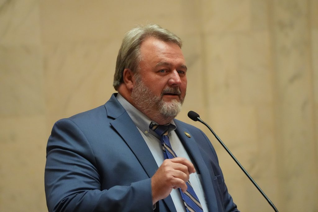 Senator Blake Johnson speaks from the Well in the Senate chamber
