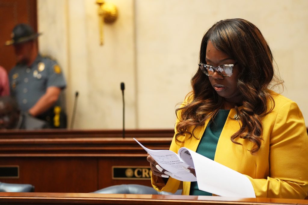 Senator Scott reads some papers in the Senate chamber.