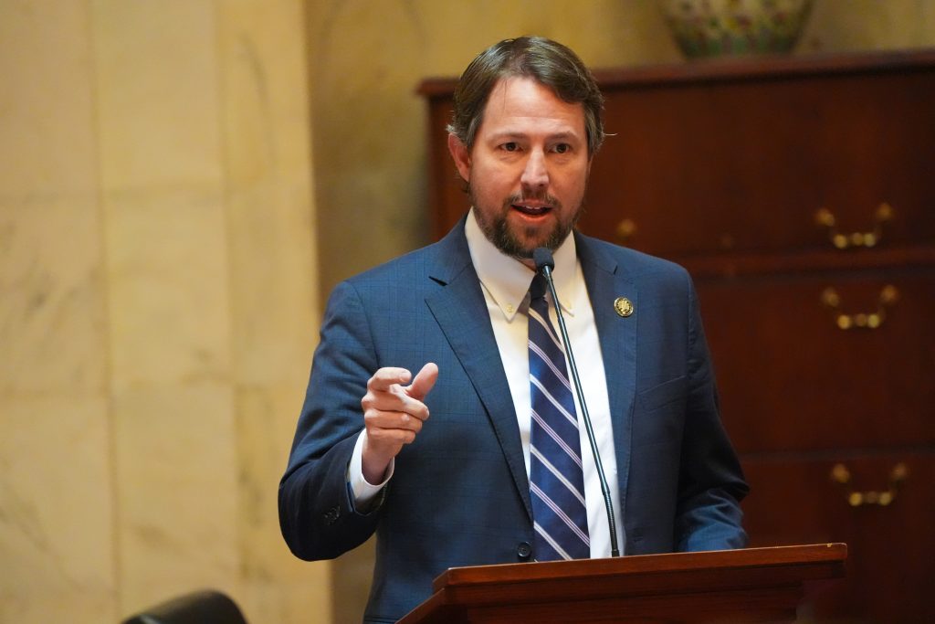 Senator Tucker speaks from the Well in the Senate chamber