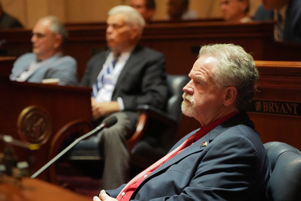 Sen. Clark listens to a speaker in the Senate chamber