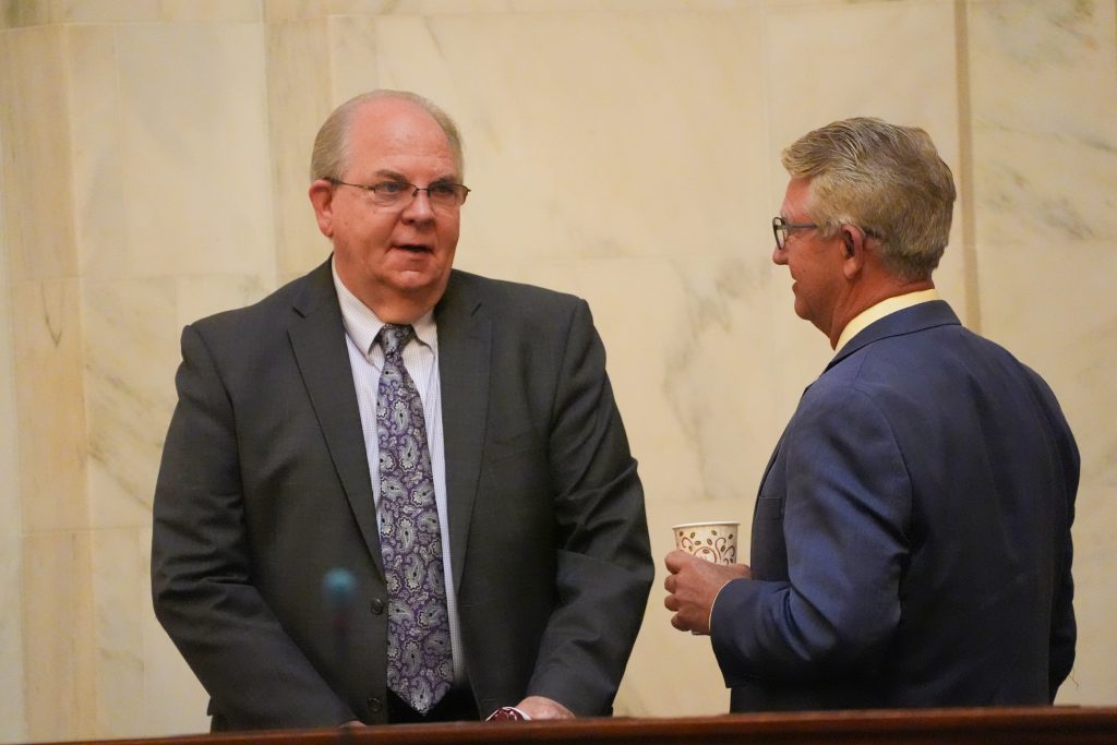 Sens Rice and Hill talk in the Senate chamber