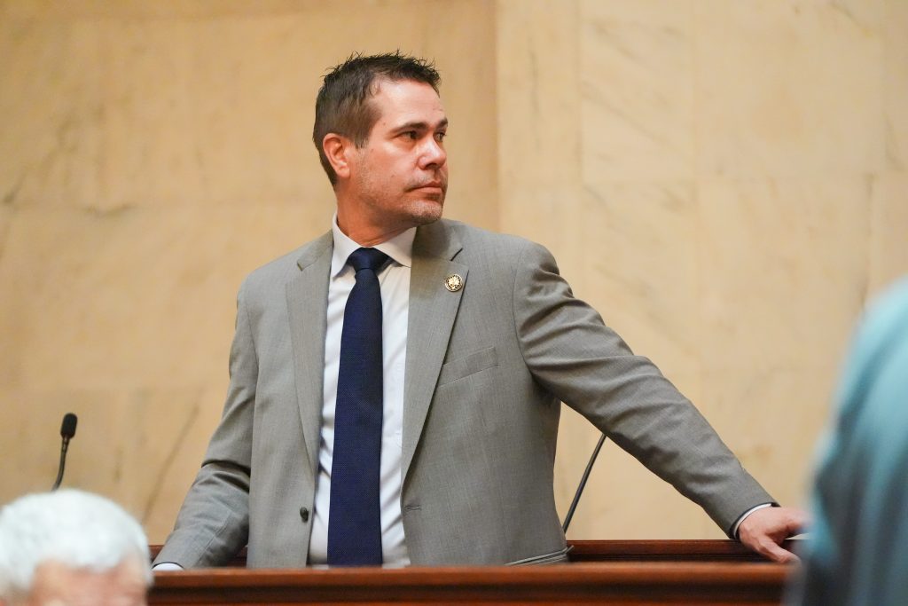 Senator Simon stands in the Senate chamber
