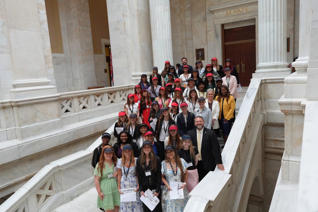 Group shot of the Girls State senators and Arkansas senators on the grand staircase outside the Senate chamber.