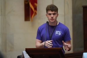 A Boys State delegate speaks from the Well in the Senate chamber