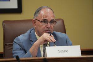 Senator Stone speaks at an audit committee meeting